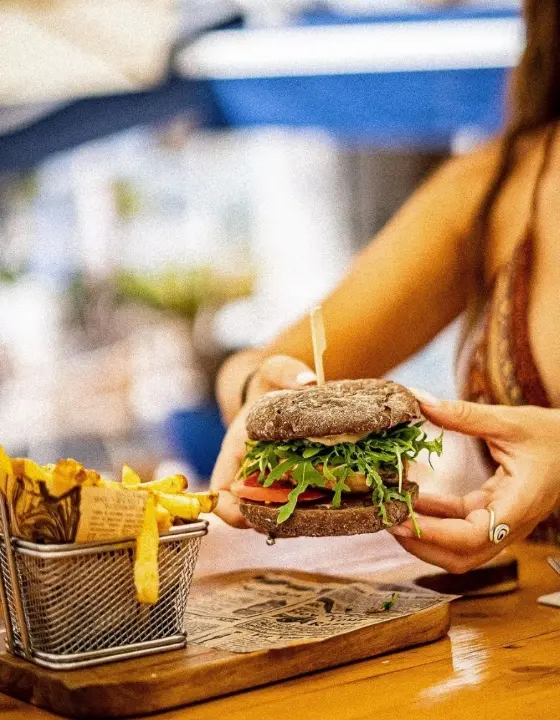 Fries, burger, woman